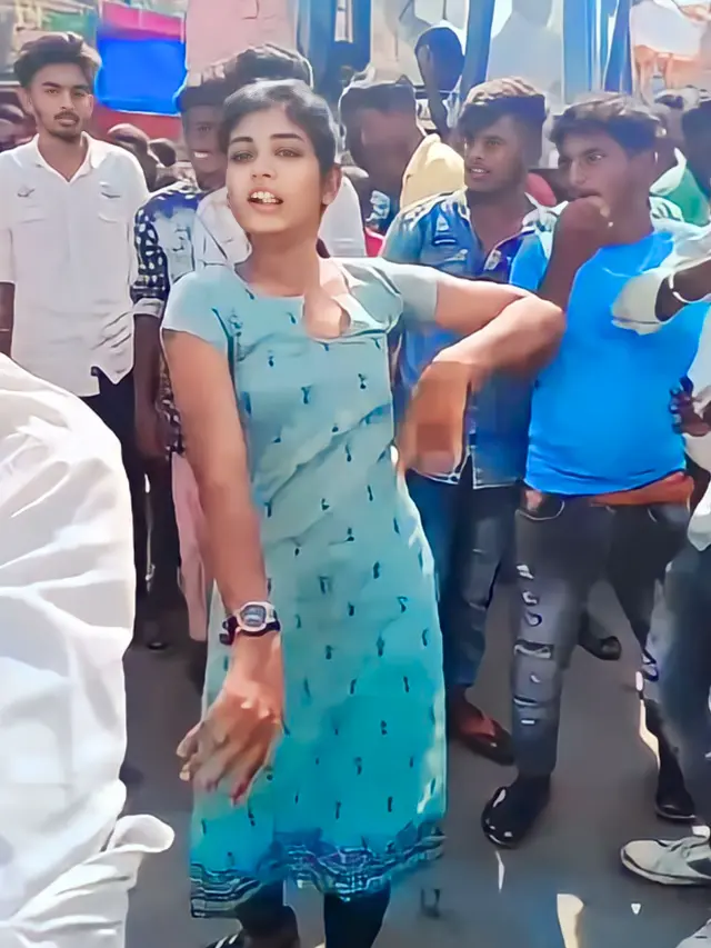 dance performed by young women in the street to the beat of drums